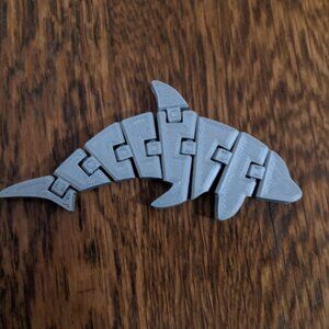 Flexi Dolphin - Quick Print is a beautifully designed 3D printable model, perfec